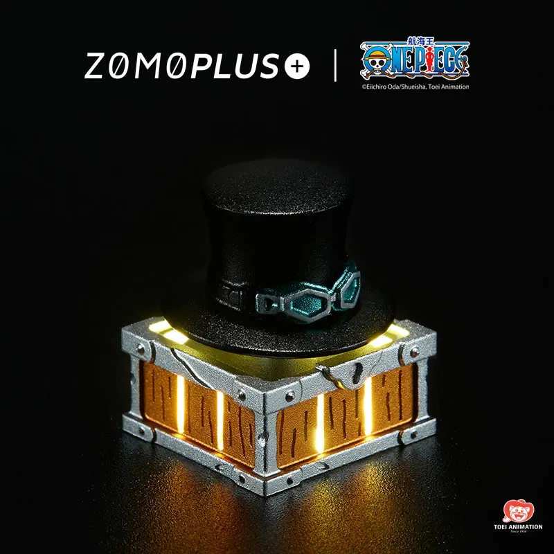 ZOMOPLUS One Piece Sabo’s Hat Rotating Aluminum Artisan Keycap Illuminated ZOMOPLUS One Piece artisan keycap featuring Sabo's black hat and blue goggles.