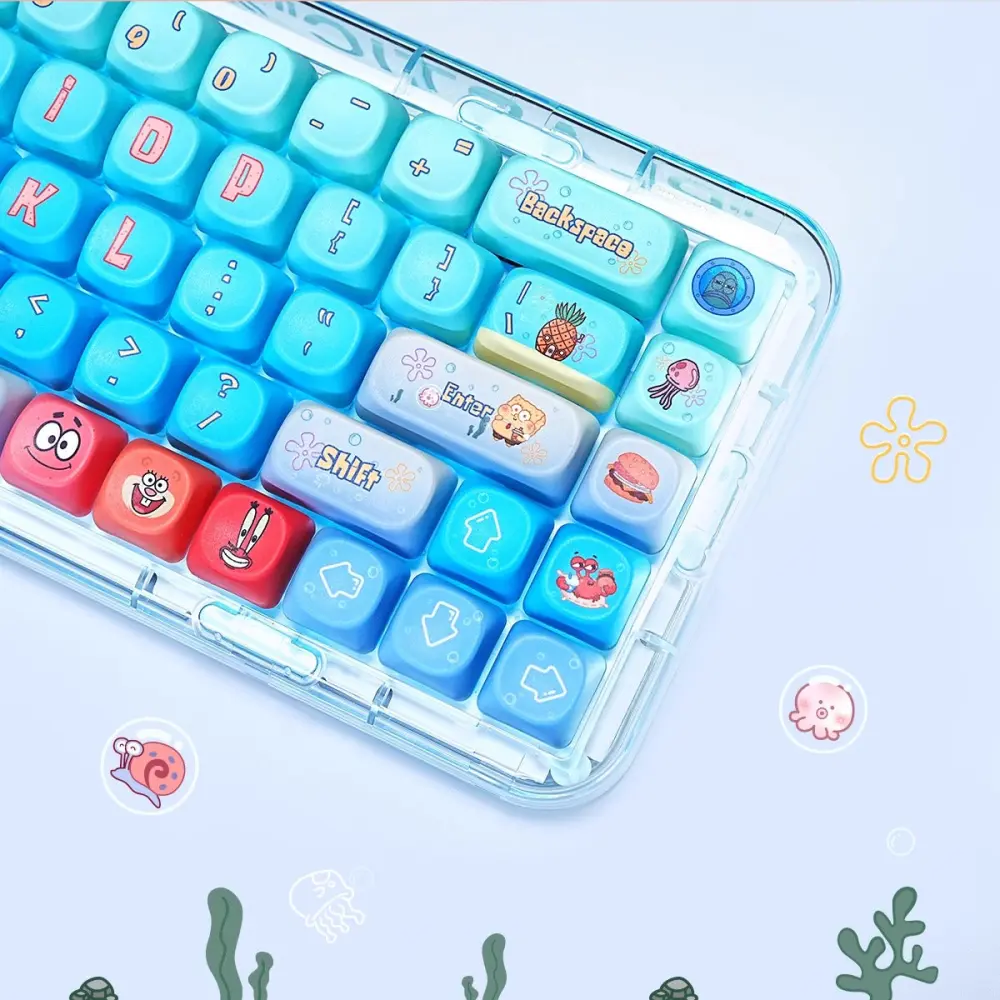 SpongeBob MOA Keycaps Close-Up Blue and red MOA profile spongebob keycaps on a clear keyboard case featuring character novelty keys.