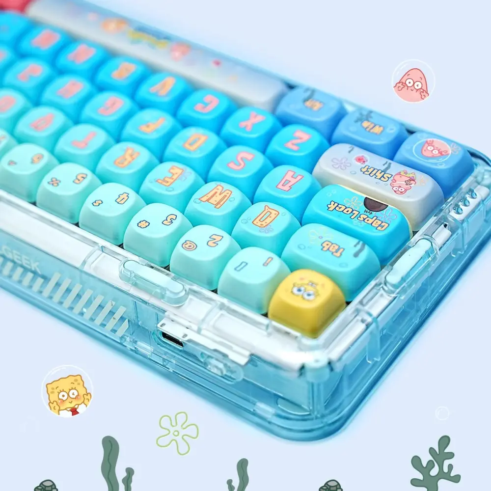 SpongeBob MOA Keycaps Close Up Light blue and yellow SpongeBob keycaps with rounded MOA profile on a transparent mechanical keyboard case.