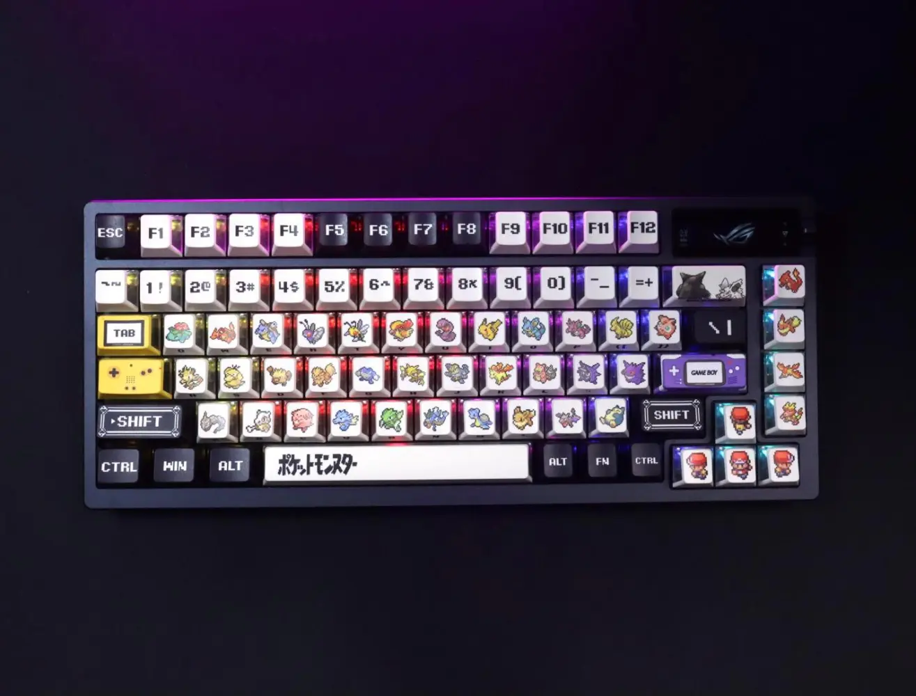 Pokemon three-side translucent keycaps on a black keyboard, showing retro pixel art and bright RGB lighting effects.
