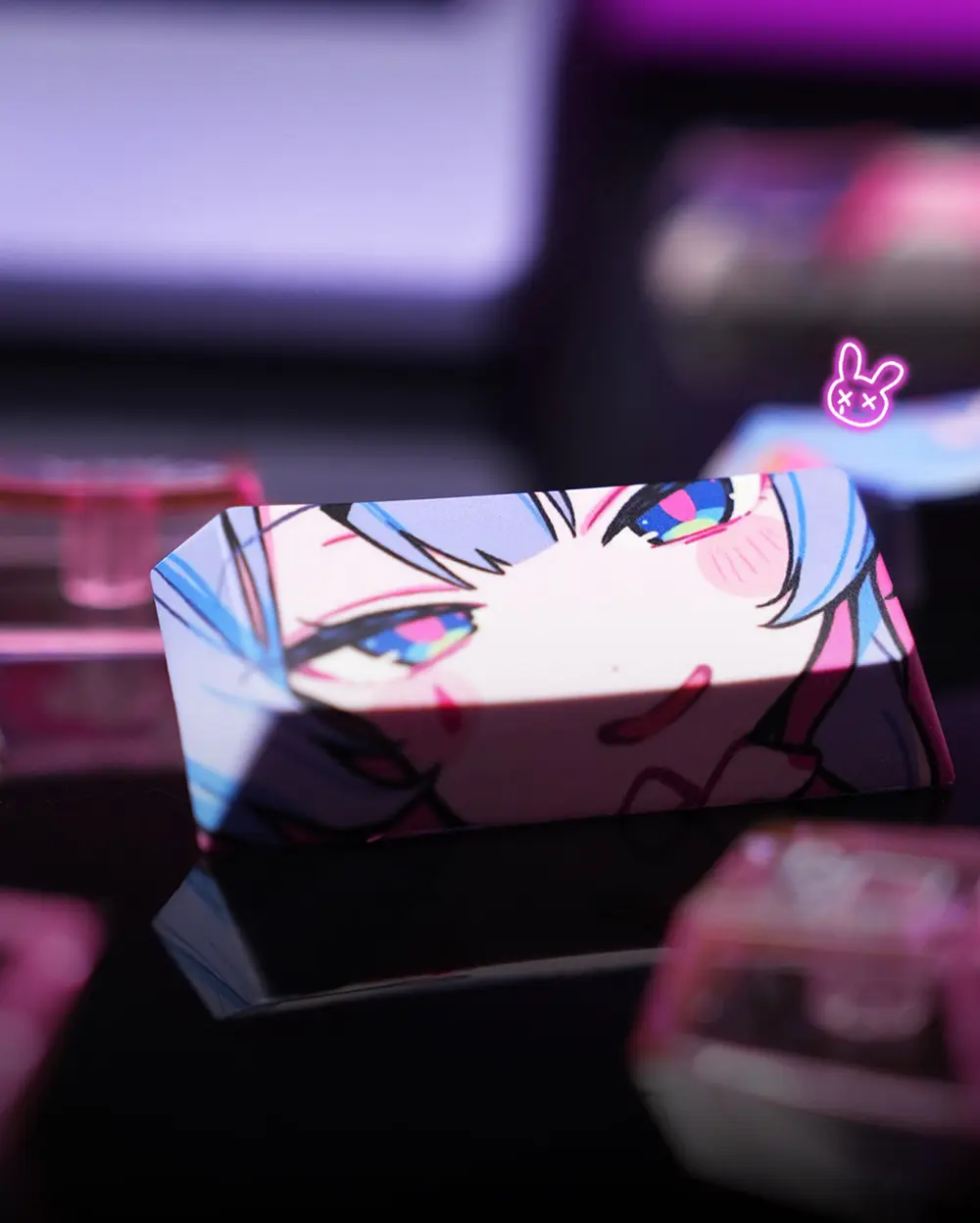Hatsune Miku Rabbit Hole Novelty Keycap Close-up Close-up of a Hatsune Miku keycap showing a printed anime face with colorful glitch eyes on a reflective surface.