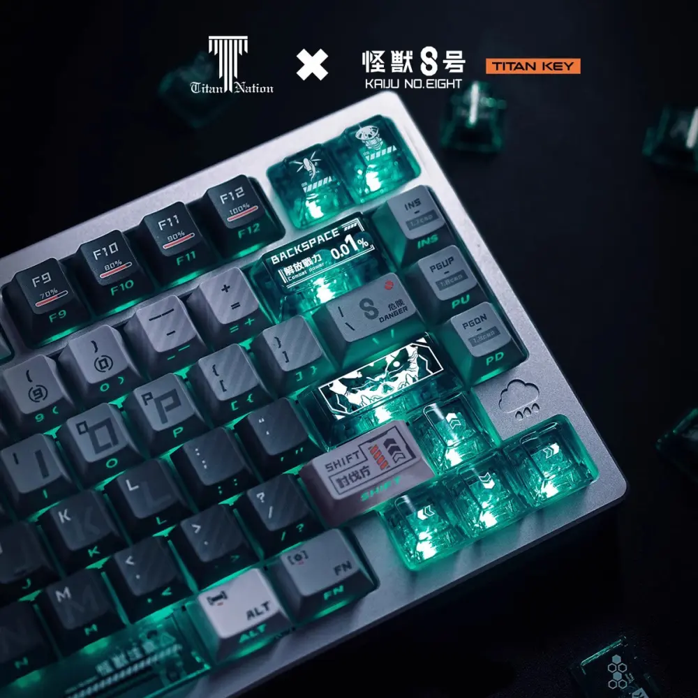 Close-up of Kaiju No. 8 side-lit keycaps on a keyboard showing glowing green transparent keys and frosted PBT.