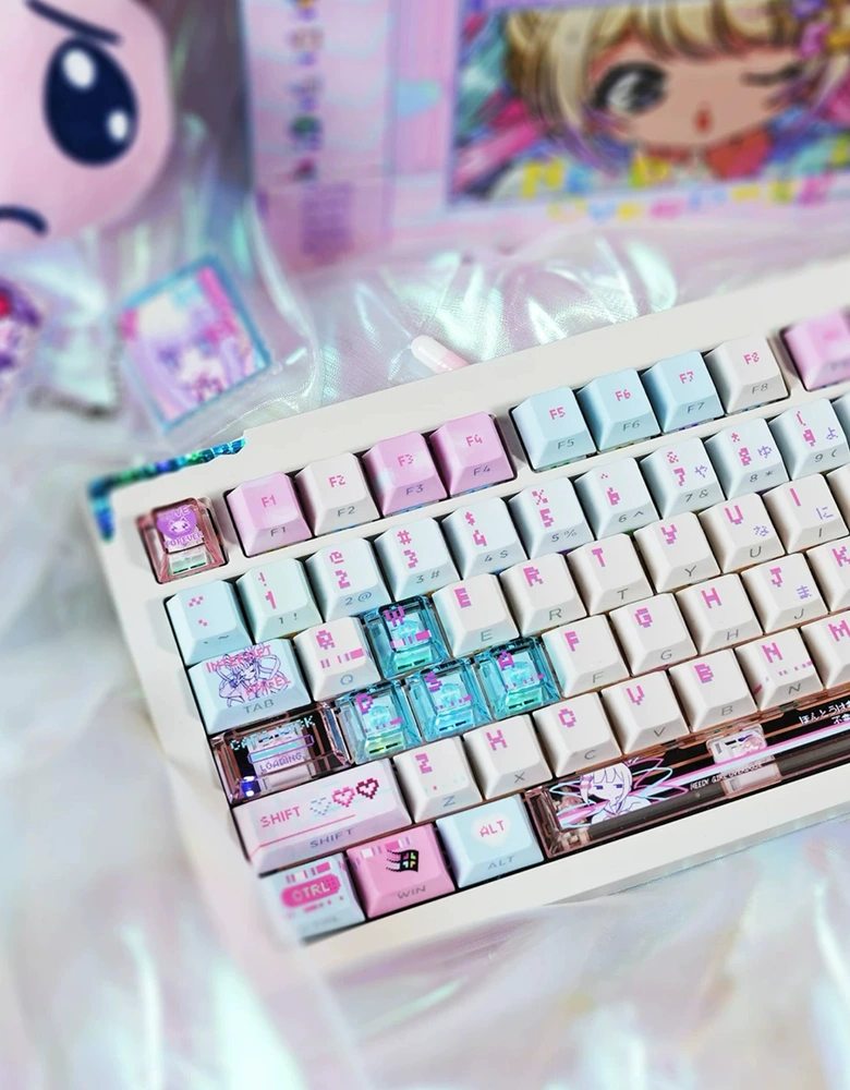 Overhead view of KAngel Cherry profile keycaps on white mechanical keyboard showing full layout with holographic desk mat