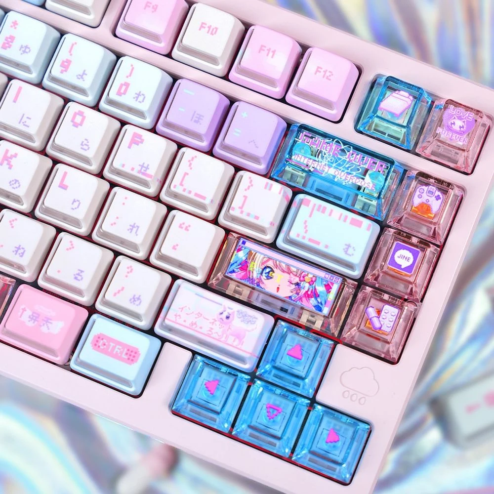 Top-down close-up of Nuclear Power profile keycaps showing sculpted spherical tops, translucent layers, and pink keyboard case