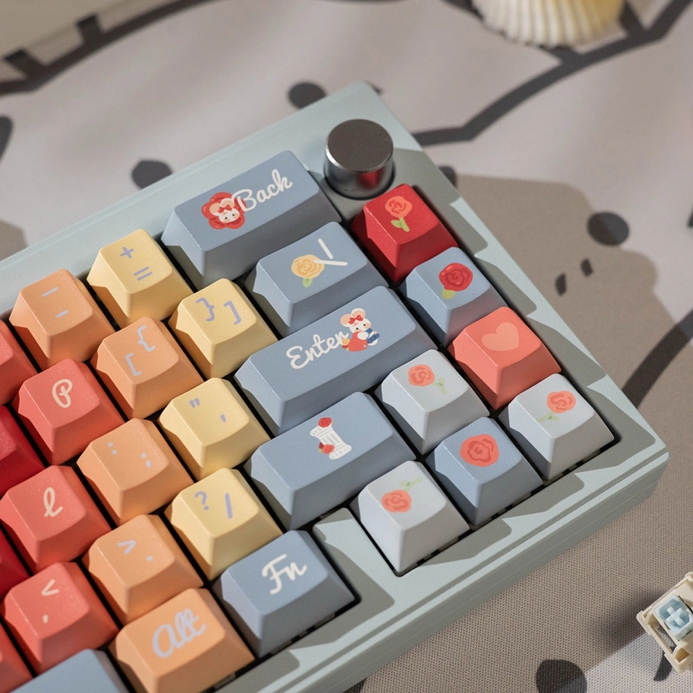 Close-up of Roses Poem keycap set in Cherry Profile with sculpted rows, pastel peach orange pink keys, rose illustrations, and white cursive legends