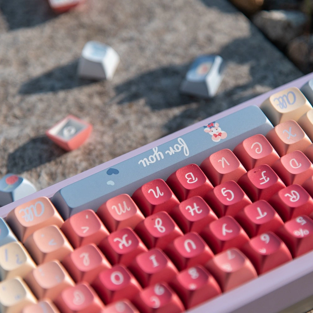 Roses Poem PBT keycaps corner angle view with product boxes and scattered keycaps in background