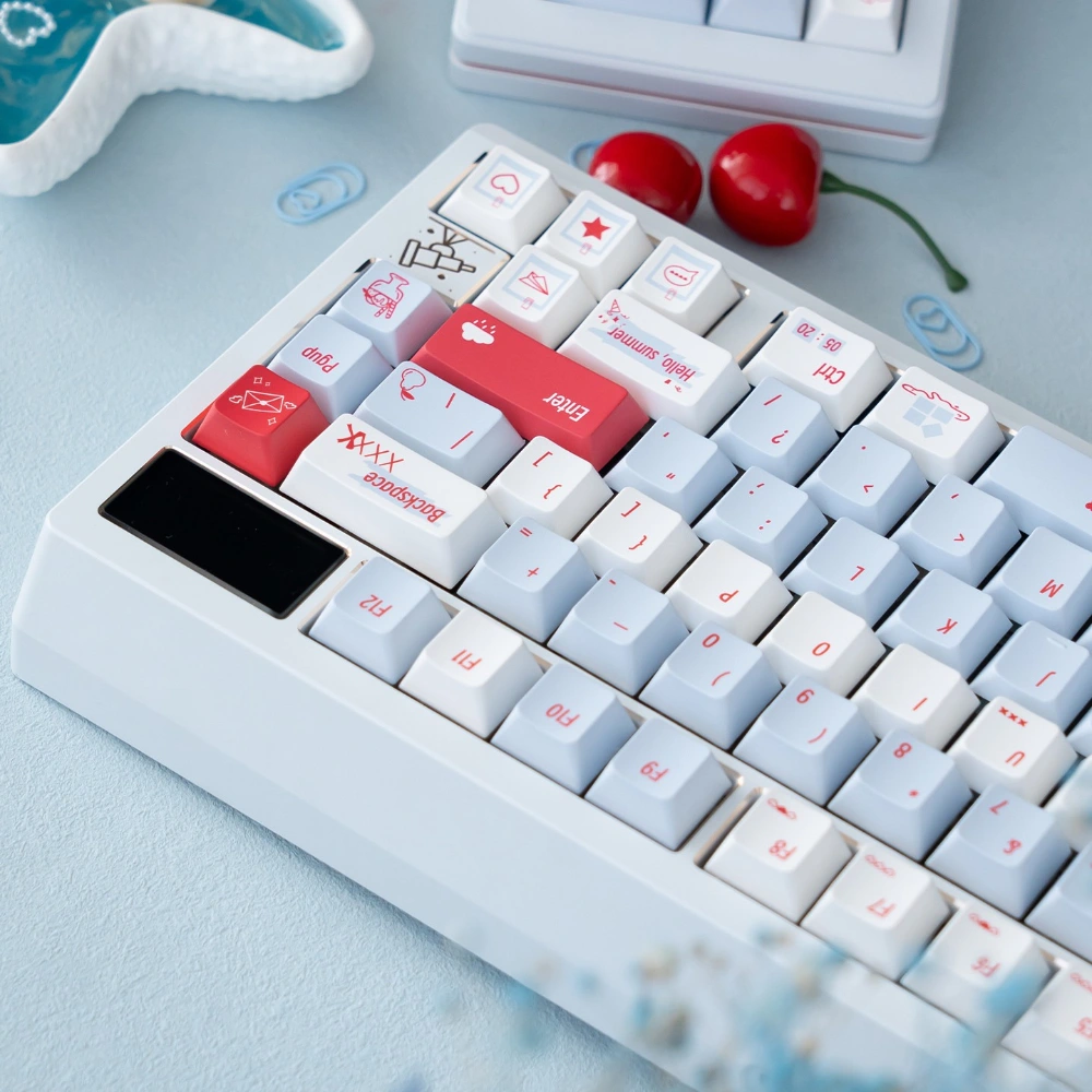 Summer blue PBT keycap set with gradient alphas and summer-themed novelty keycaps on a mechanical keyboard