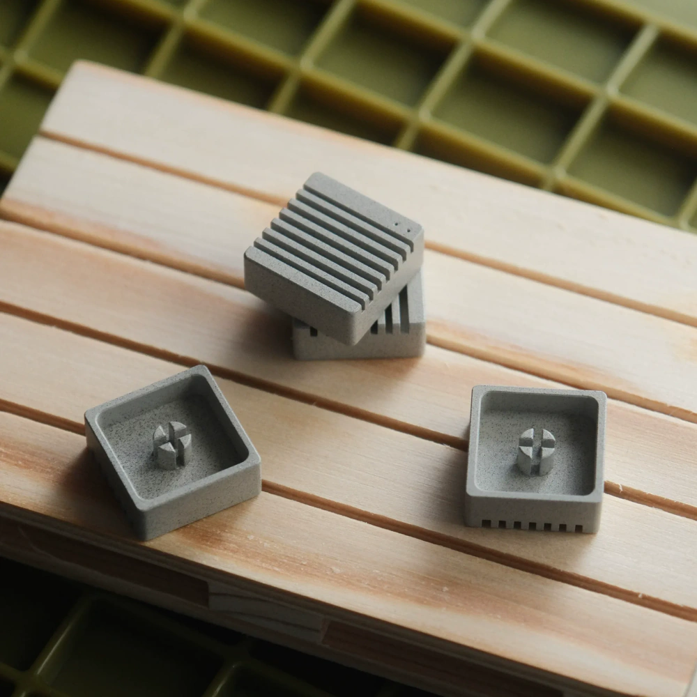 Grey Heatsink Metal Artisan Keycaps Grey CNC aluminum metal artisan keycaps showing the ribbed design and MX cross stem mounts.