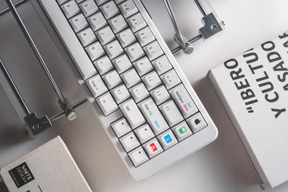 Retro Mac Specific PBT Keycaps White Keyboard Close-Up Close-up view of retro Mac specific white PBT keycaps with vintage Apple iconography and Command key layout.