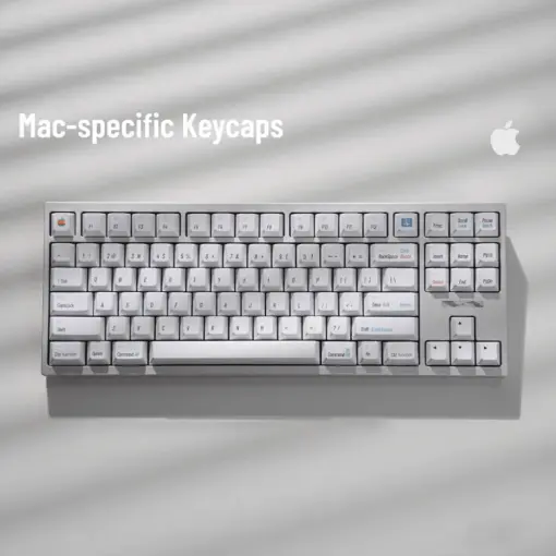 Retro white Mac keycap set with classic Apple command modifiers and vintage iconography displayed on keyboard.