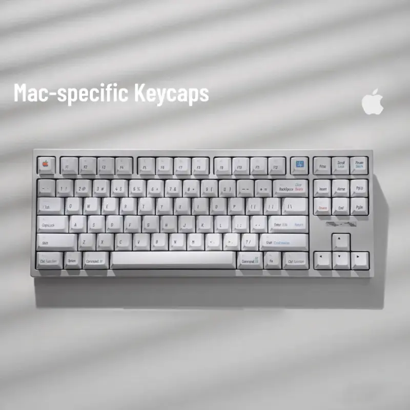 Retro white Mac keycap set with classic Apple command modifiers and vintage iconography displayed on keyboard.