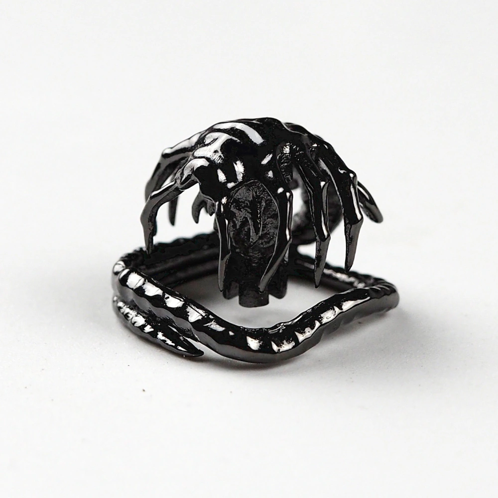 Black Alien Facehugger Keycap Black metal alien facehugger artisan keycap showing detailed carved legs and tail.
