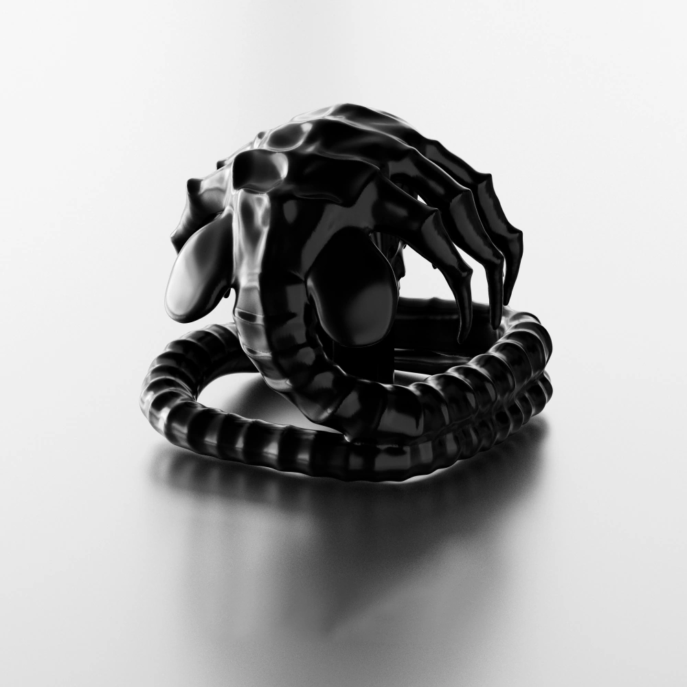 Black Alien Facehugger Metal Keycap Black electroplated Alien Facehugger handcrafted metal artisan keycap on a light background.