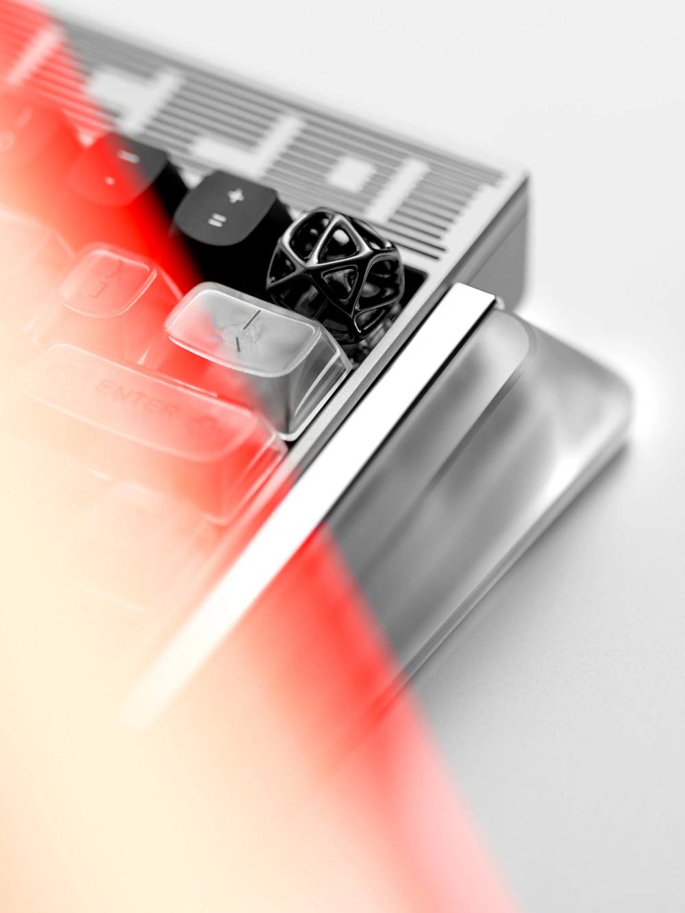 Black Hollow Metal Artisan Keycap Black hollow platinum artisan keycap with a futuristic cell lattice design on a keyboard.