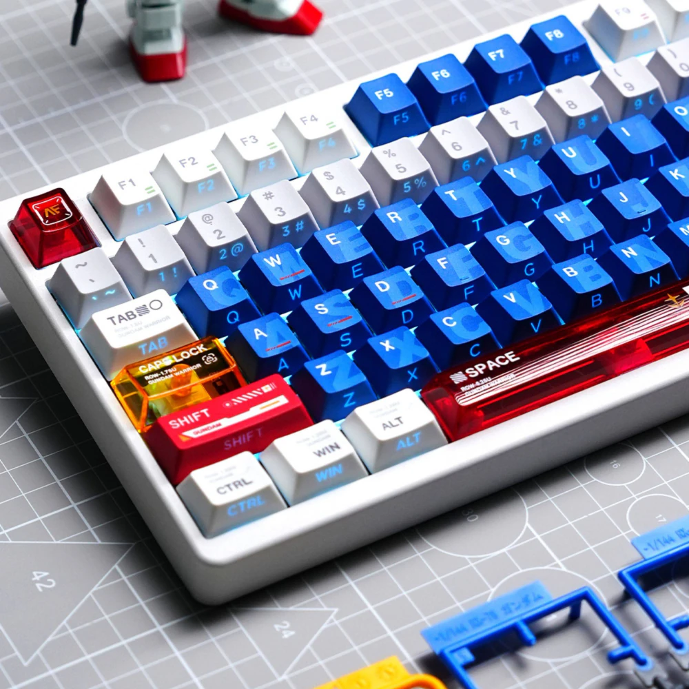 Mecha Armor Blue Translucent Alpha Keycaps Mecha Armor side-lit keycaps with blue alpha keys, red warning spacebar, and orange caps lock detail.