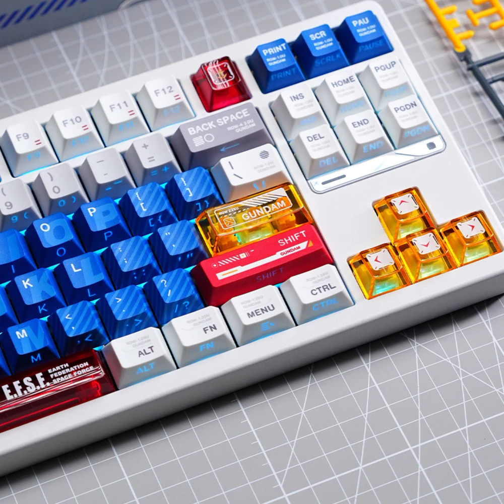 Mecha Armor Side-lit Keycaps on White Keyboard White keyboard with Mecha Armor side-lit keycaps showing blue translucent alphas, red accents, and gold arrow keys.