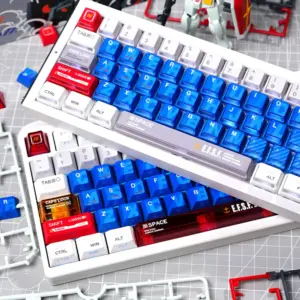 Mecha Armor side-lit keycaps on two keyboards with blue alphas, red and gold accents, and E.F.S.F. spacebars.