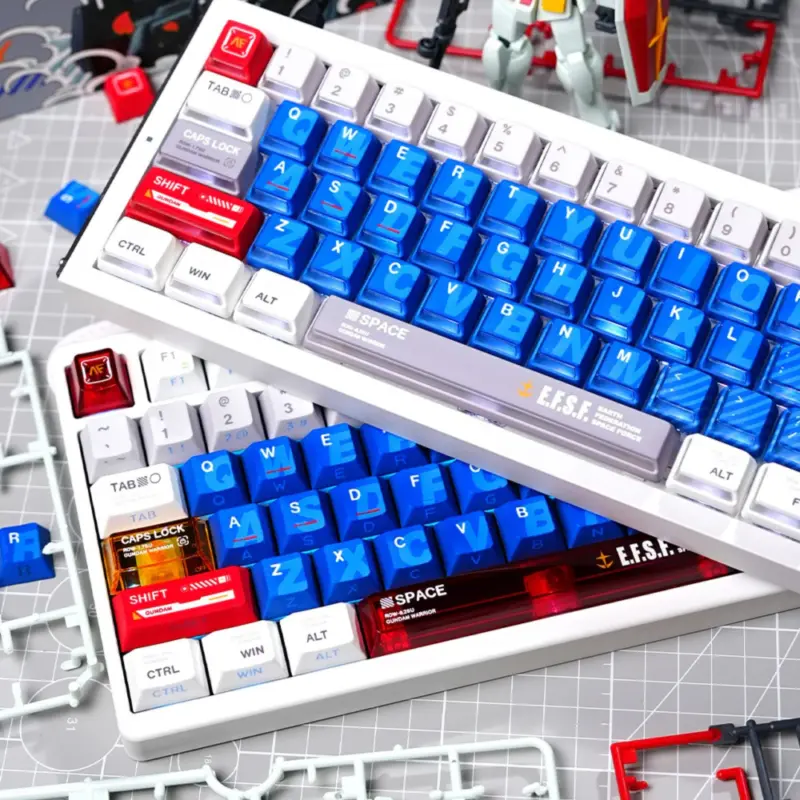 Mecha Armor Side-lit Nuclear Power Profile Keycaps on Two Keyboards Mecha Armor side-lit keycaps on two keyboards with blue alphas, red and gold accents, and E.F.S.F. spacebars.