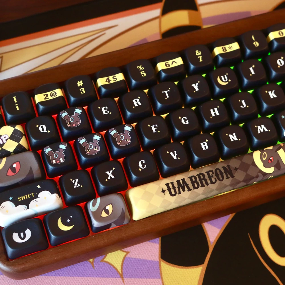 Moonlit Companion MOA keycaps with black warm gold accents and red backlighting.
