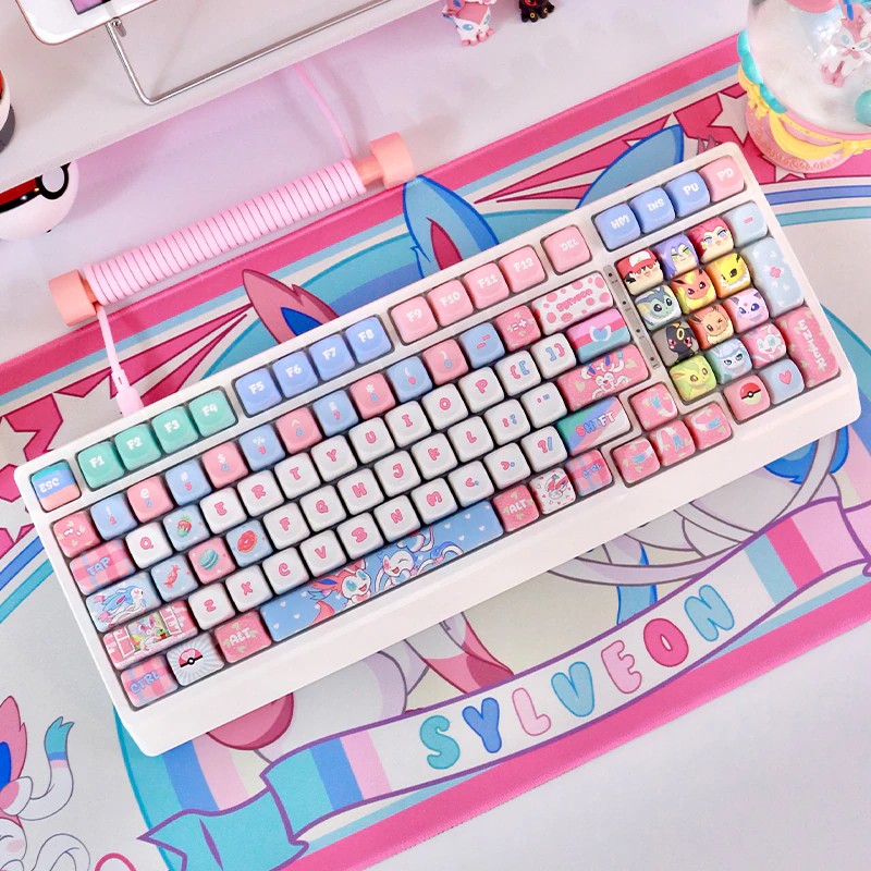 Pastel Dream Companion MOA Keycaps on White Keyboard Pastel Dream Companion MOA Profile Keycaps featuring rounded pink, blue, and white caps with accent keys.