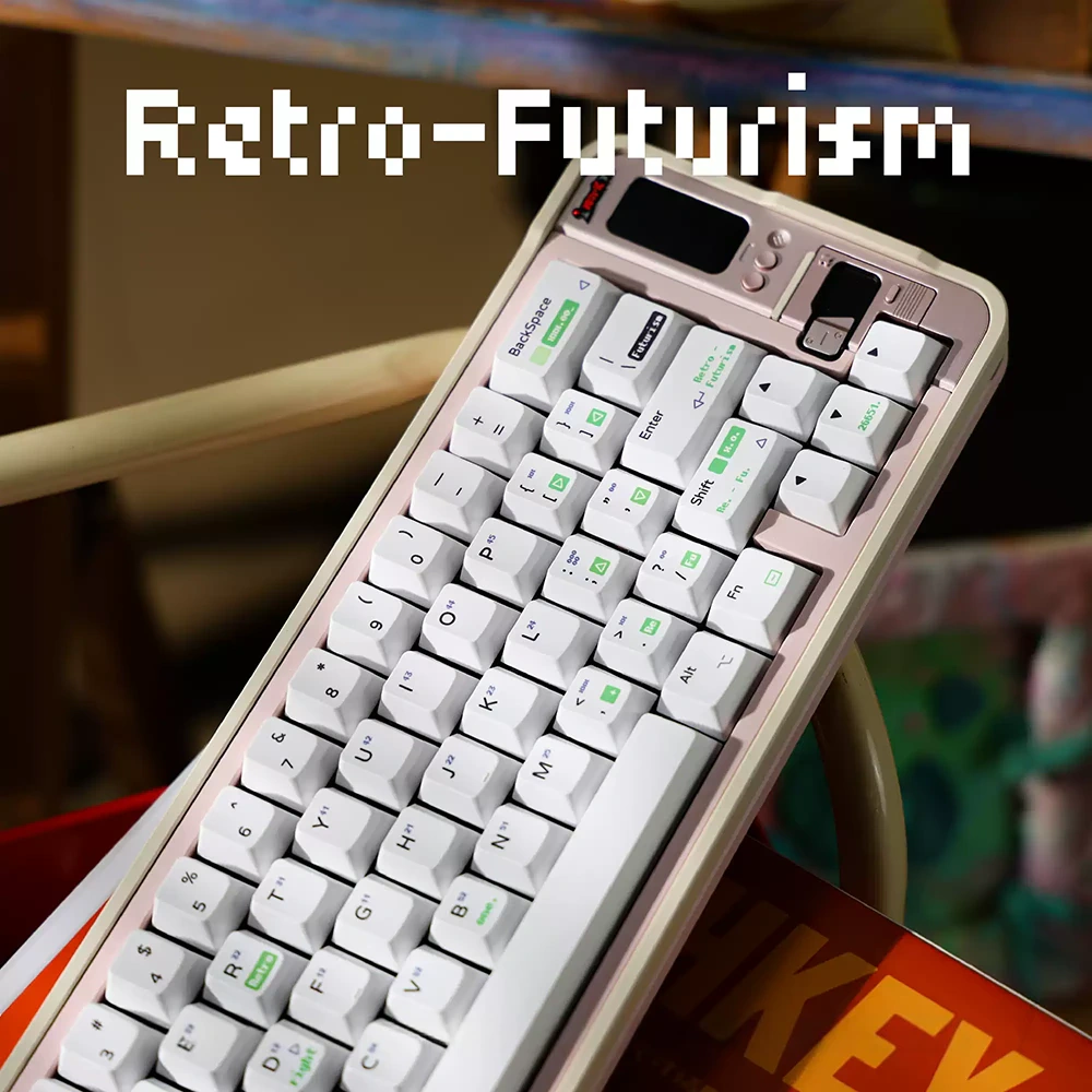 White retro futurism keycaps with neon green pixelated sub-legends installed on a mechanical keyboard.