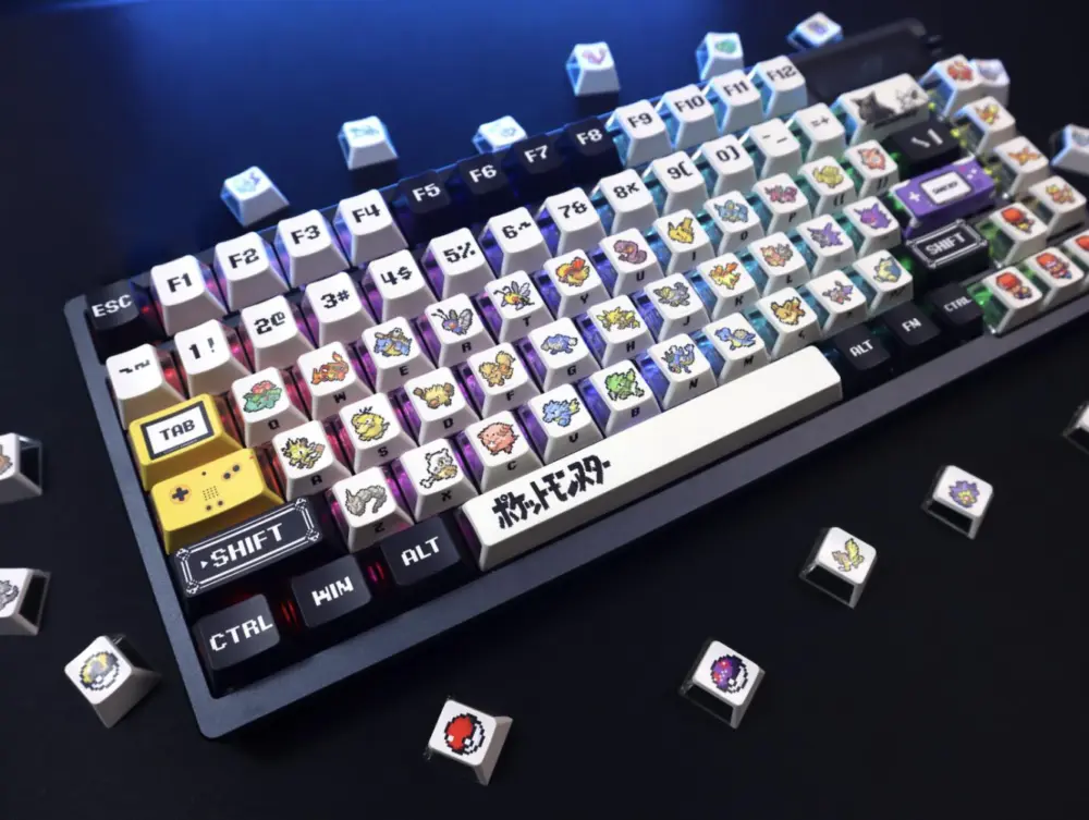 Retro red and green pixel keycaps showing RGB side glow on keyboard.