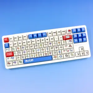 White TKL keyboard with retro ruby and sapphire cherry profile pixel art keycaps and blue accents.