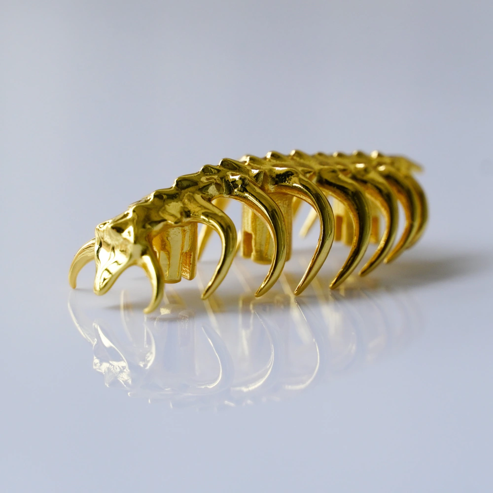Sci-Fi Creature Keycap Gold Side Profile Handmade copper keycap featuring gold electroplated creature with curved tusks.