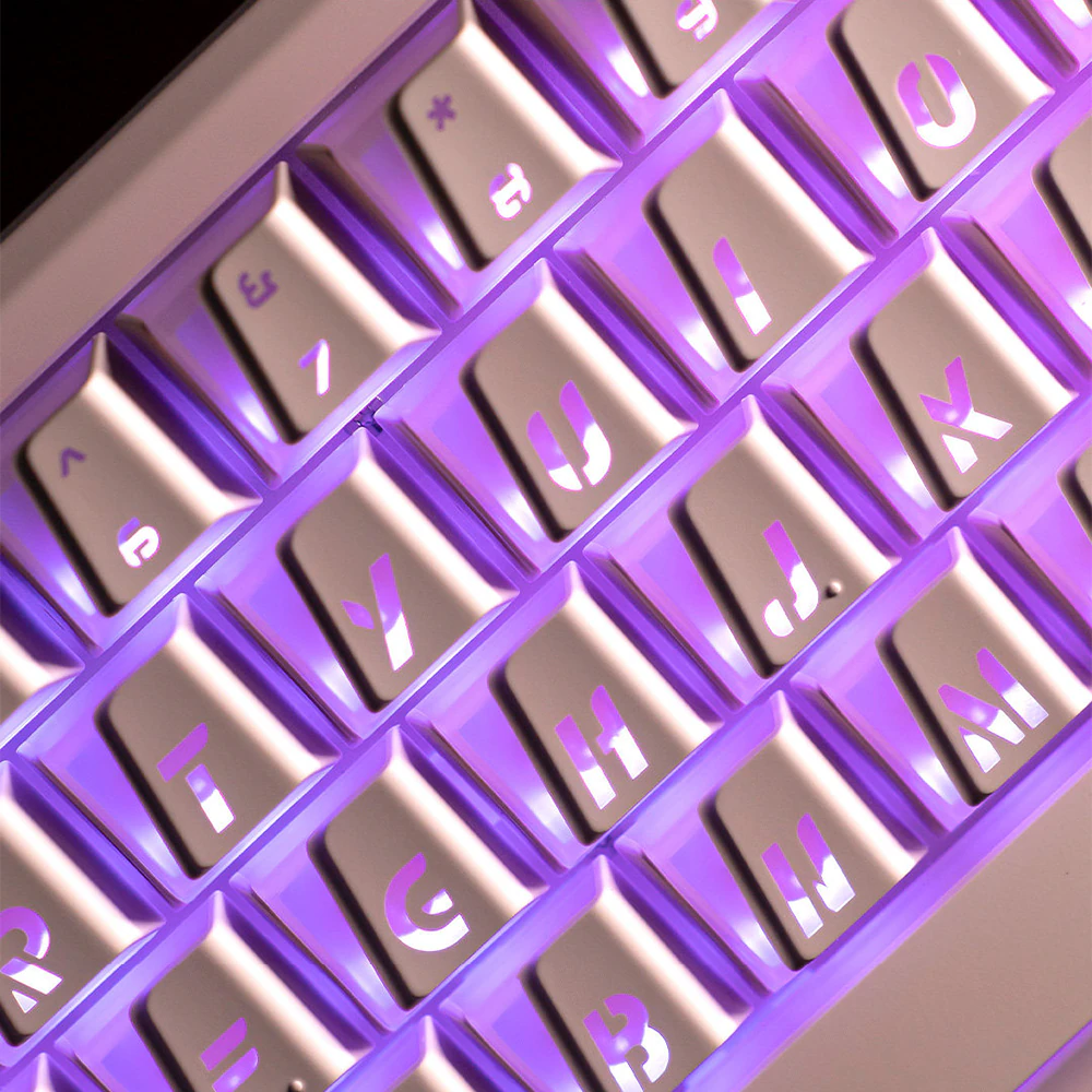 Pink Prism keycaps close-up with translucent sidewalls and glowing gaps