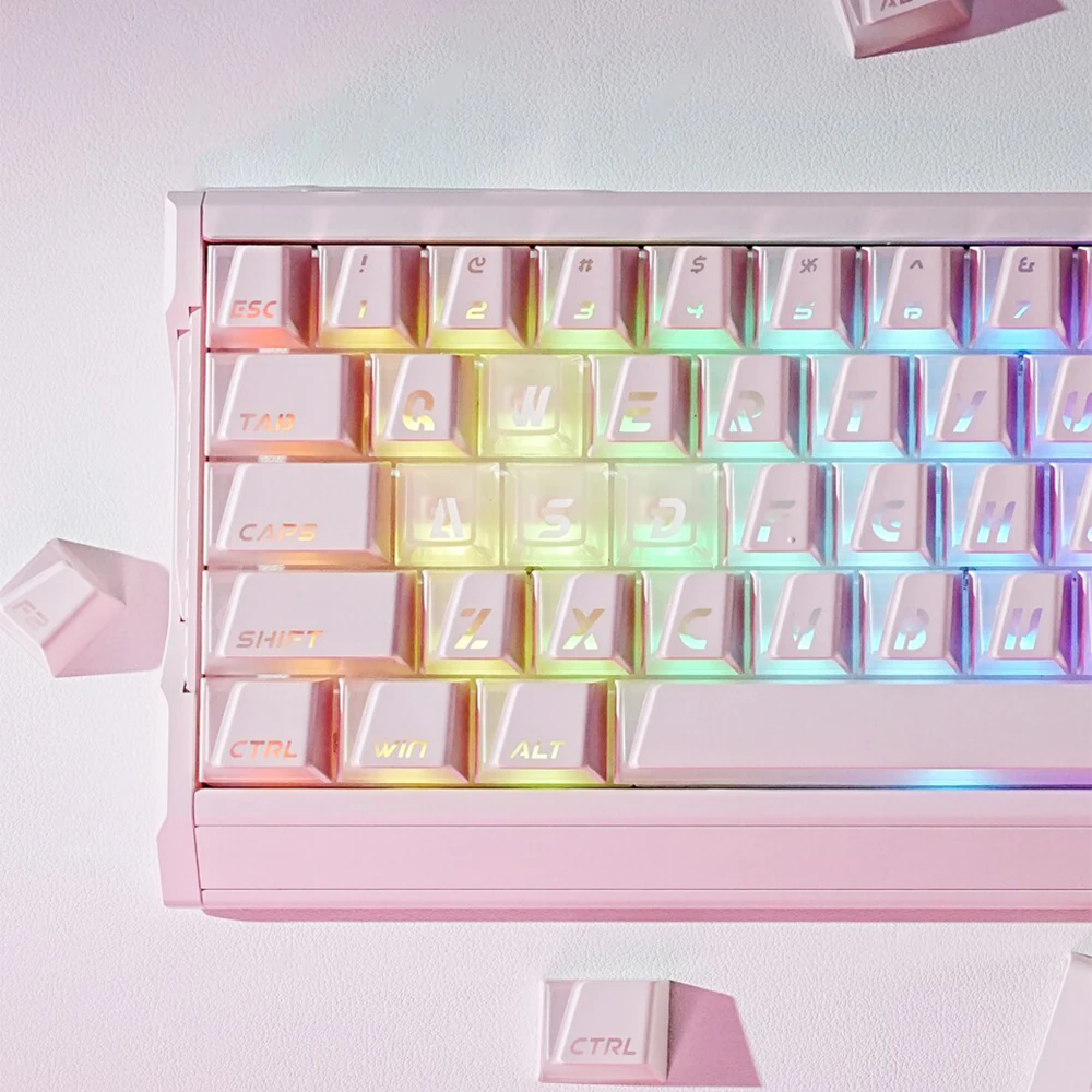 Pink Prism keycaps on a light keyboard with multicolor RGB shining through