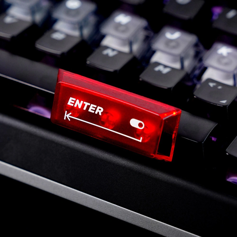 Close-up of a translucent Enter key with frosted home row keycaps behind it