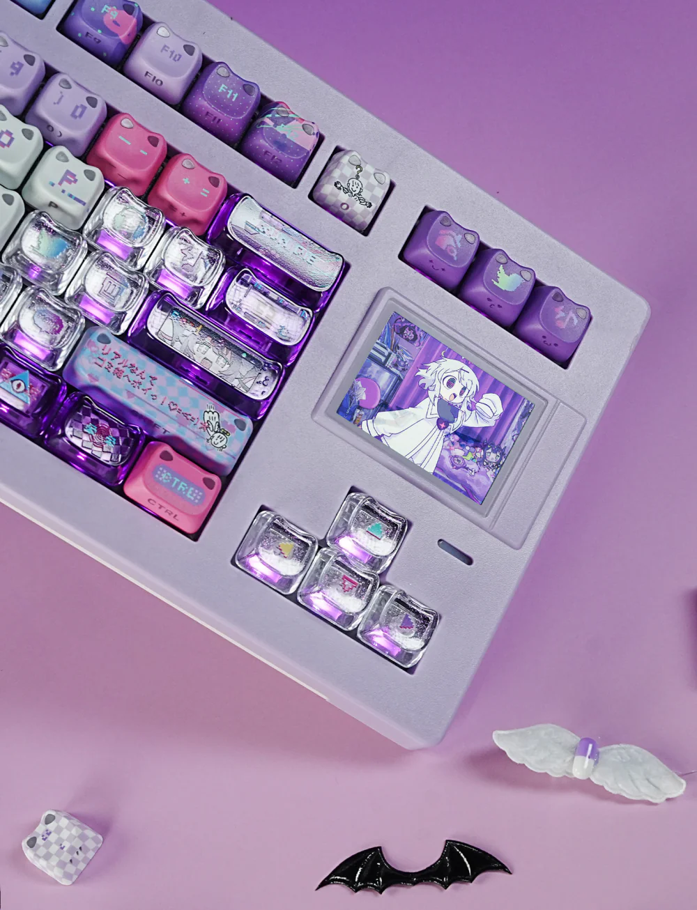 Close-up of purple, pink, white, and translucent Yunyun Denpa MAO Profile keycaps