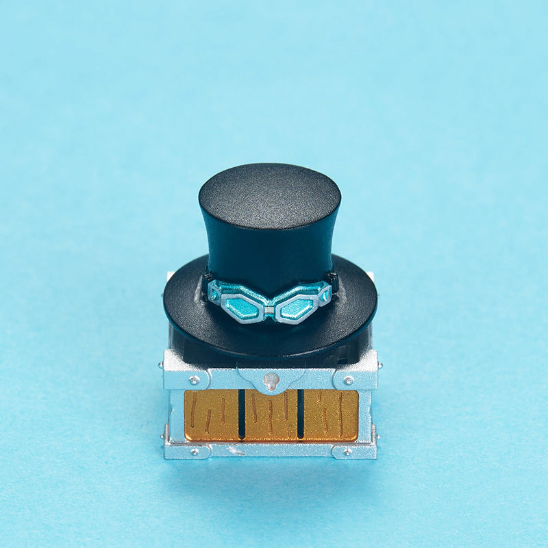 Sabo Rotating Hat Aluminum Artisan Keycap Close front view of a black top hat keycap with teal goggles and a chest base.