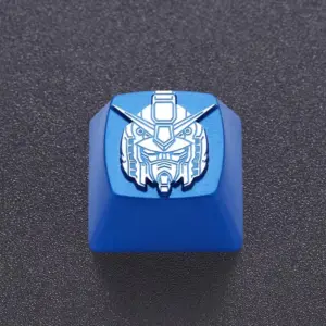 Close view of engraved linework on a blue metal mecha head keycap.