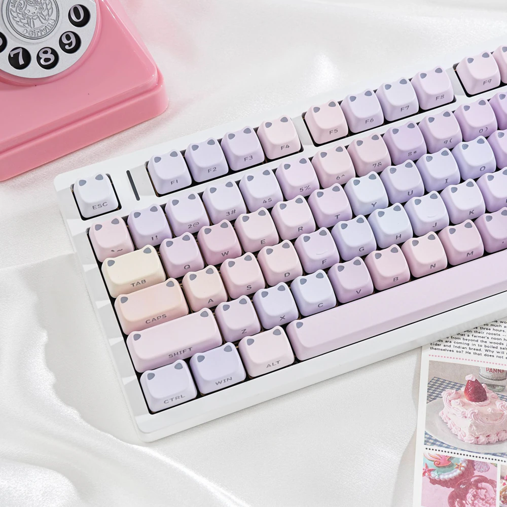 Angled white keyboard view with pastel cat-ear MAO profile keycaps