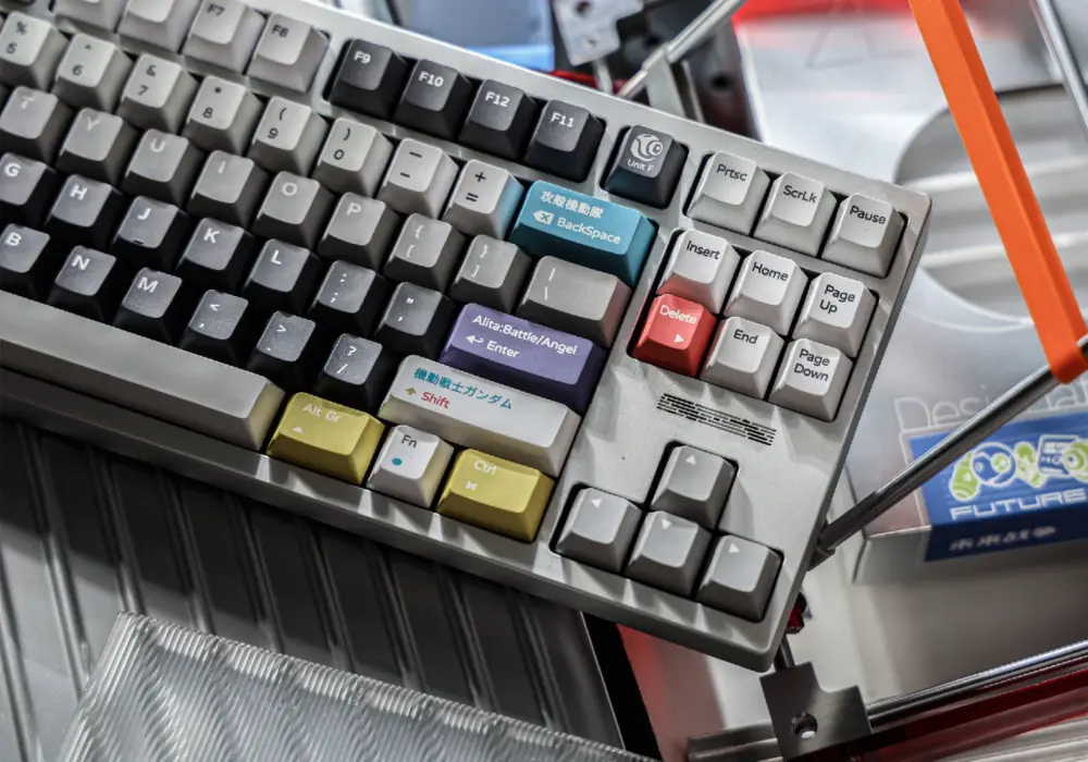 Keyboard seen at an angle, with the navigation keys and accent keys in view.