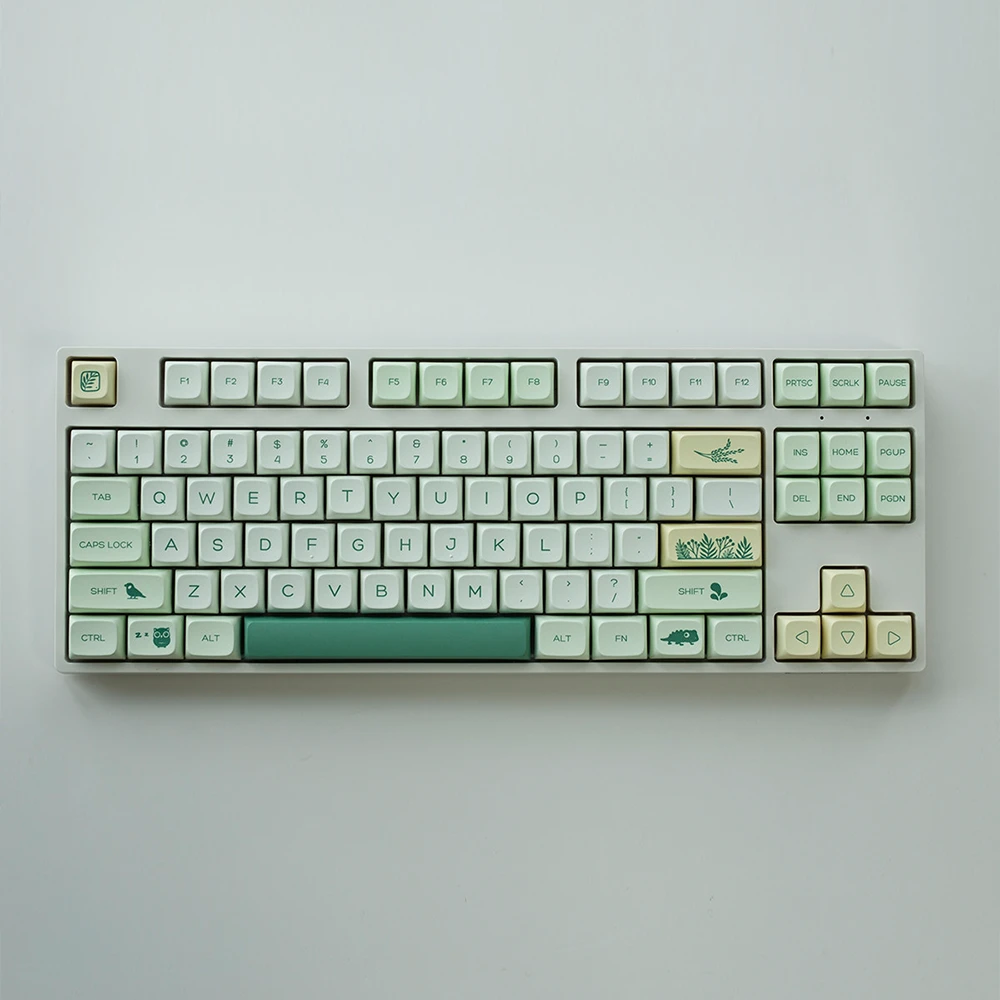 Green Botanical XDA Profile Keycaps Front View Front view of a keyboard fitted with green and white botanical and animal themed keycaps.