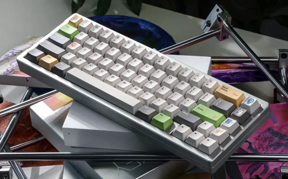 Light Graffiti Maze Full Angled View Full keyboard at an angle with pale keys, dark modifiers, and green and yellow accents.