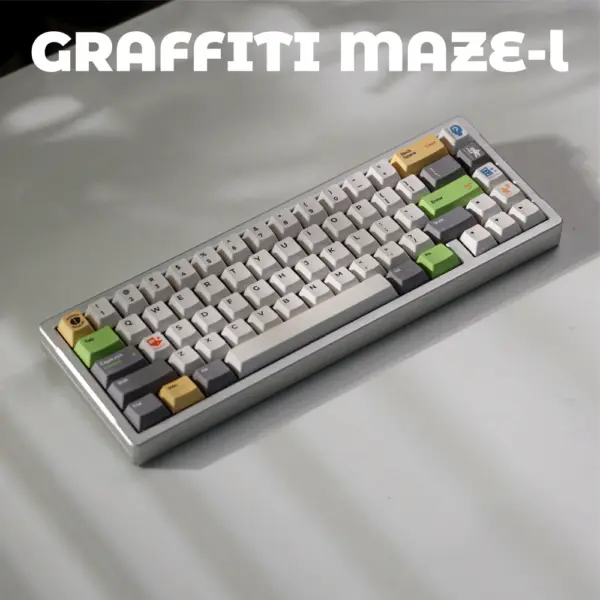 Light Graffiti Maze Cover Keyboard Angled keyboard with pale gray keys, dark gray modifiers, and green and yellow accents.