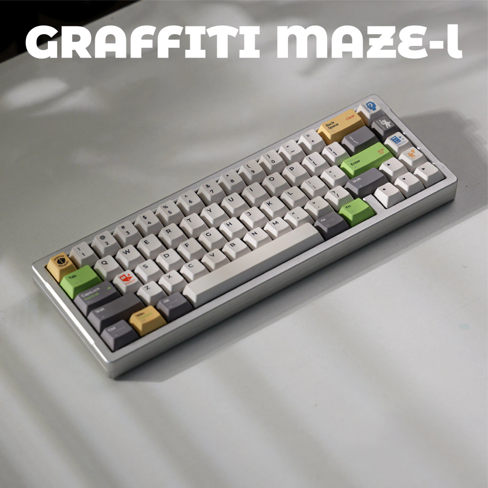 Light Graffiti Maze Cover Keyboard Angled keyboard with pale gray keys, dark gray modifiers, and green and yellow accents.