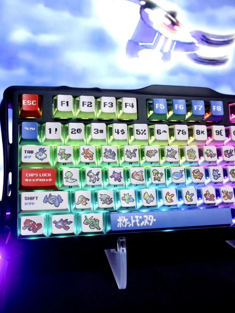 Close left-side view of white pixel keycaps with colored light visible between the keys.