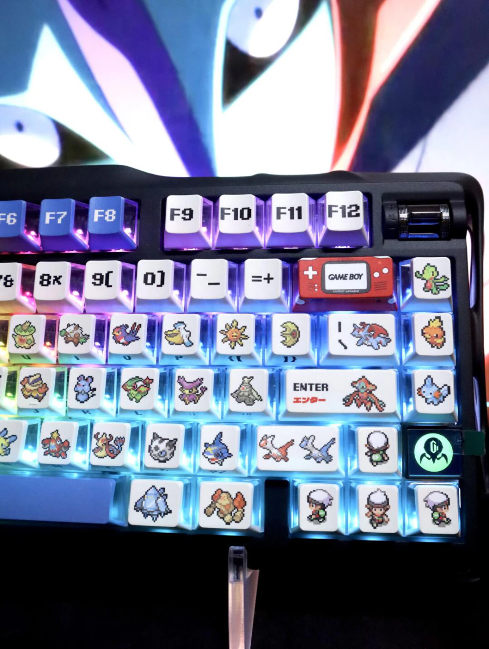 Close right-side view of blue and white pixel keycaps with colored light between the keys.