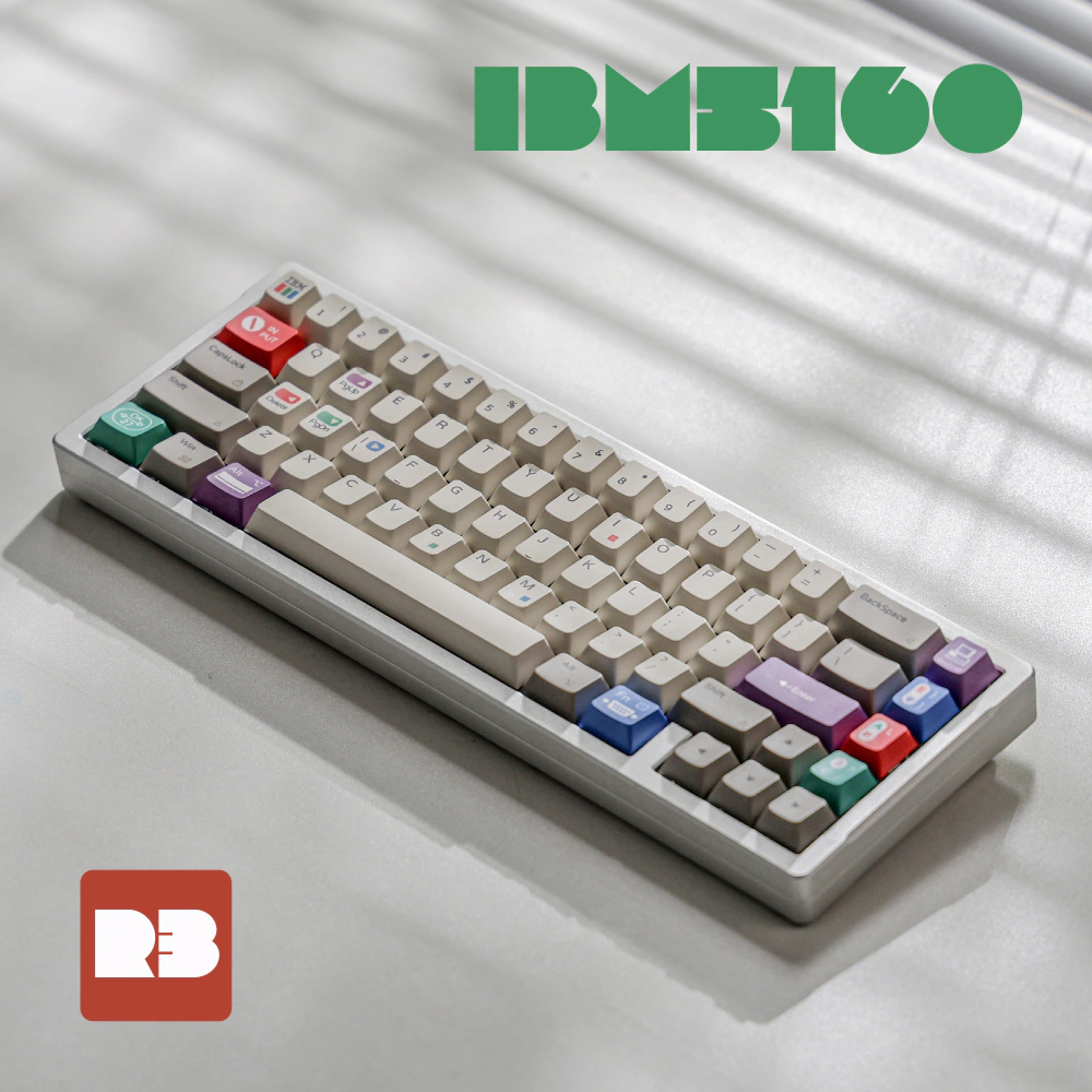 White keyboard with colored accent keys shown at an angle on a white surface.