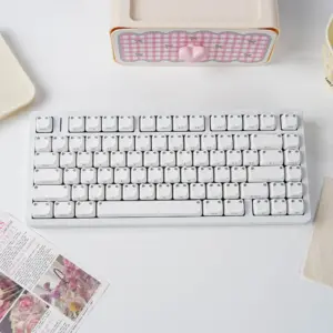 White cat-ear MAO profile keycaps installed on a white keyboard
