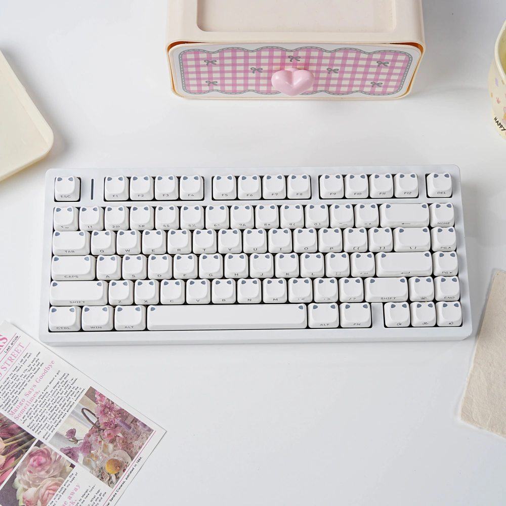 White Cat-Ear MAO Profile Keycaps White cat-ear MAO profile keycaps installed on a white keyboard