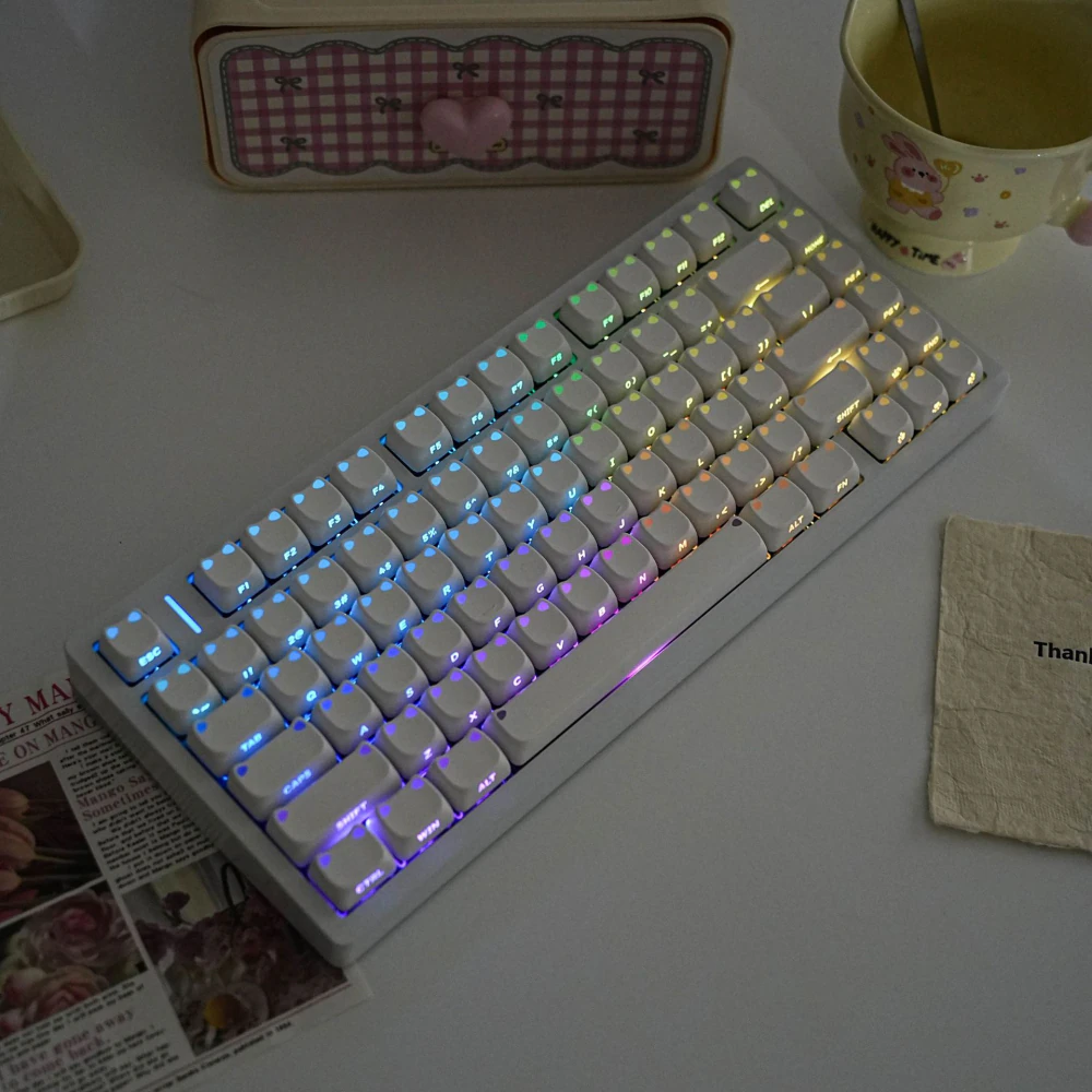 White Cat-Ear Keycap Detail White rounded keycaps showing molded cat-ear corners and front-side legends