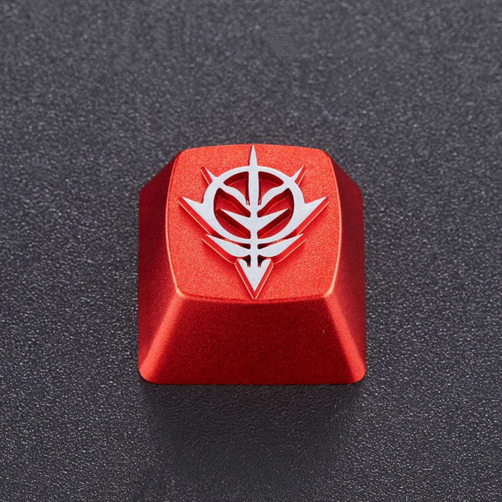 Front close-up of a red keycap with a raised white Zeon emblem.